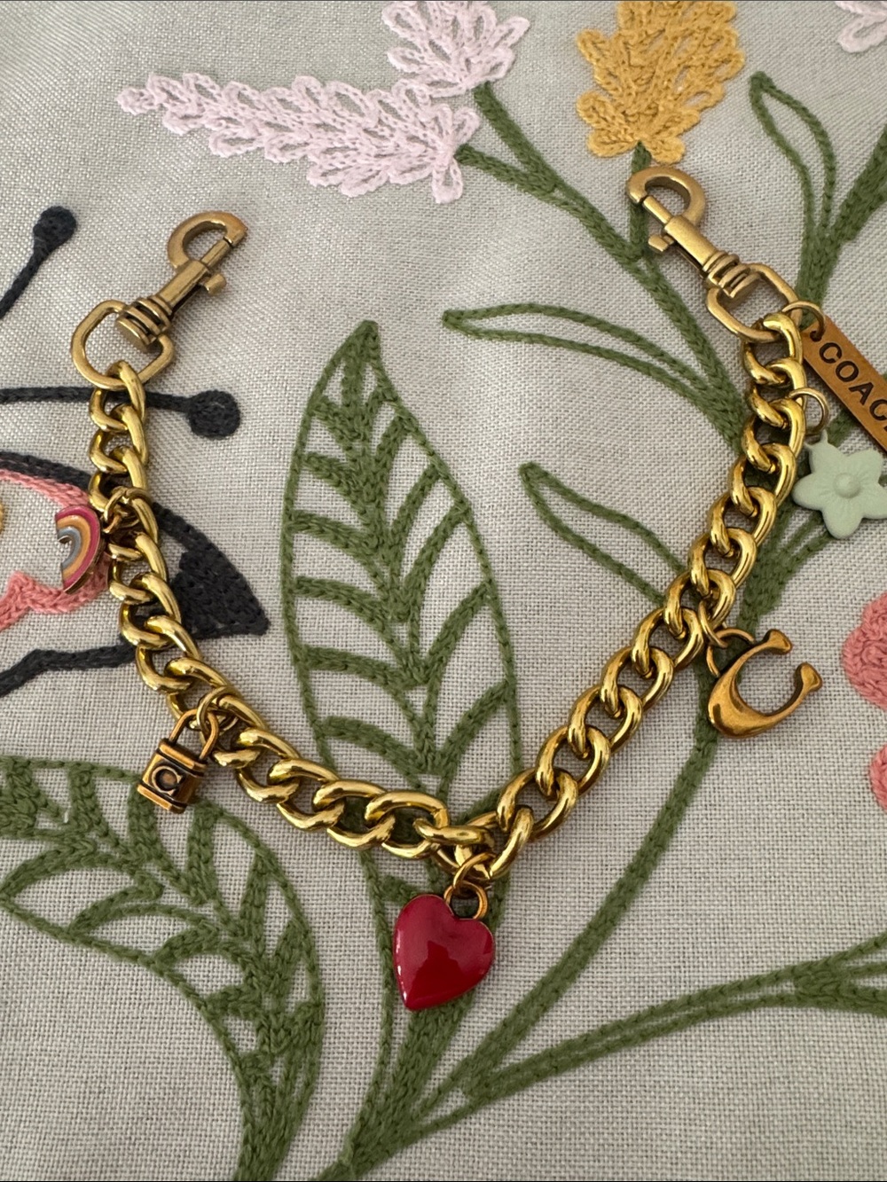 Coach Gold-Tone Charm Bracelet with Red Heart Enamel
